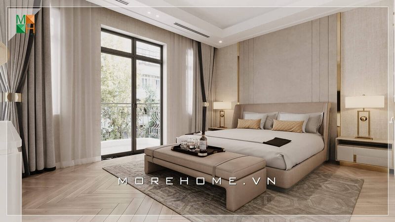 Giường ngủ bệt bọc nỉ màu kem có thiết kế đầu giường bo cong mềm mại, giúp tạo cảm giác thoải mái khi tựa lưng.